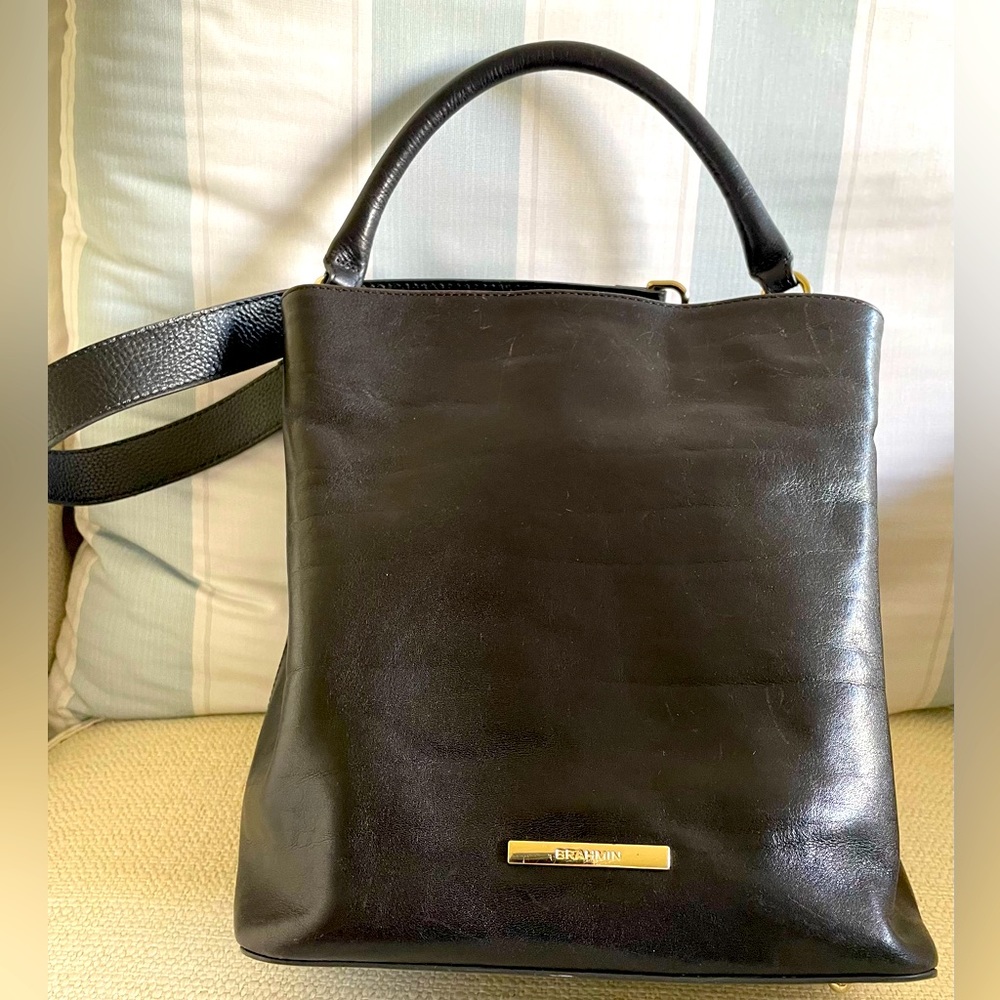 Brahmin black leather bucket bag.